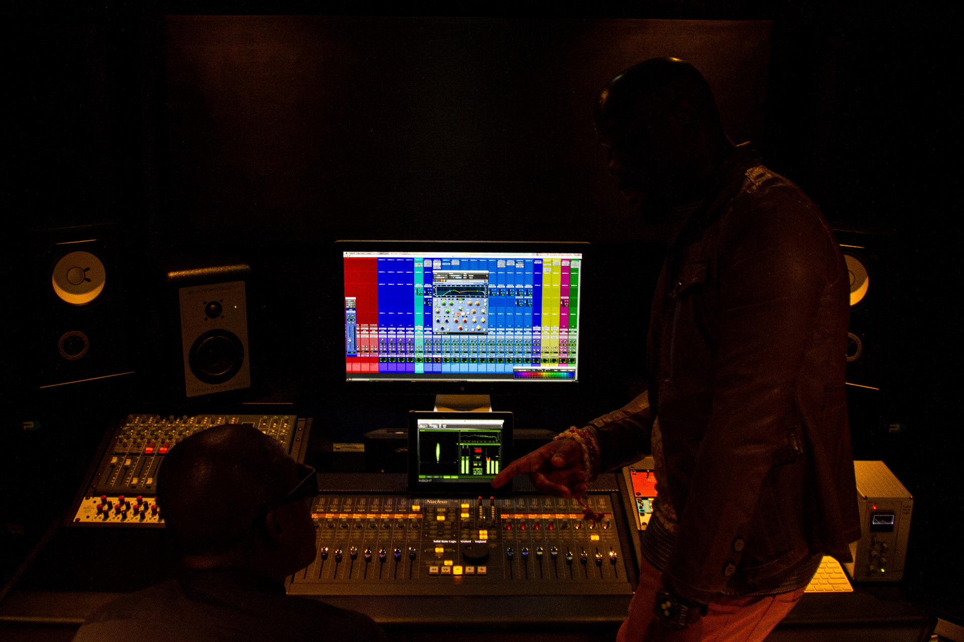 Jason “Shaft” Bishop working at a studio mixing console